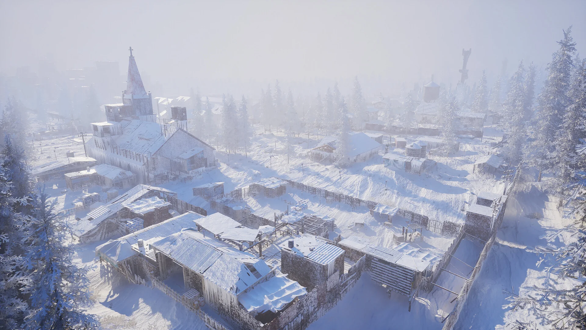 Aerial view of a snow-covered Permafrost settlement with a church